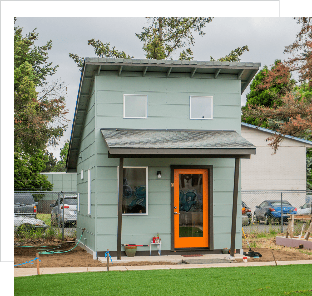 Compact two-story home with garden