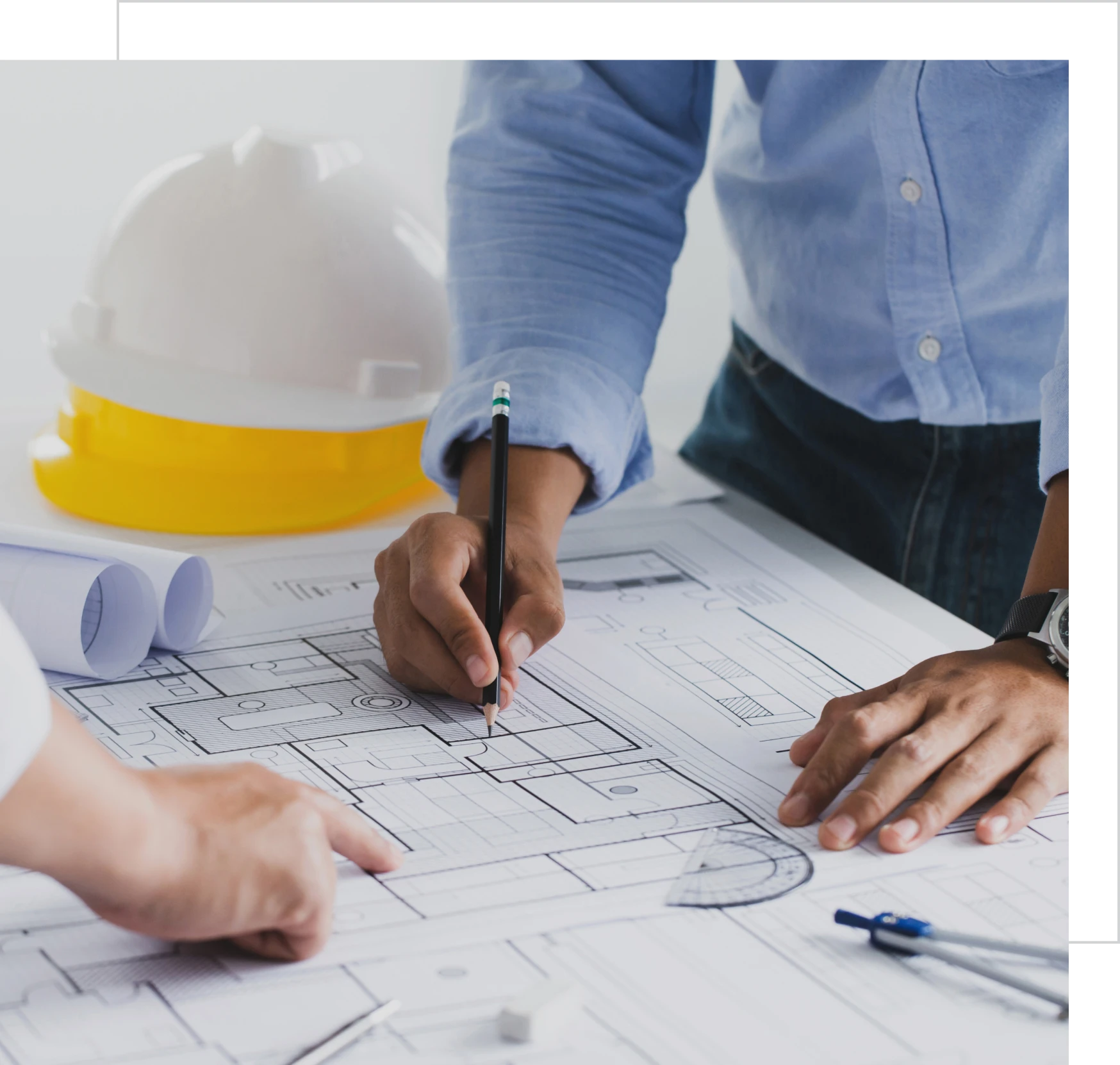 Engineers collaborating on construction design