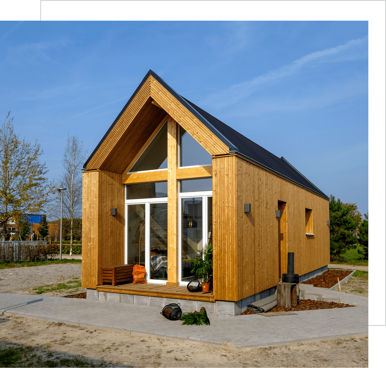 Contemporary timber cabin in sunny setting